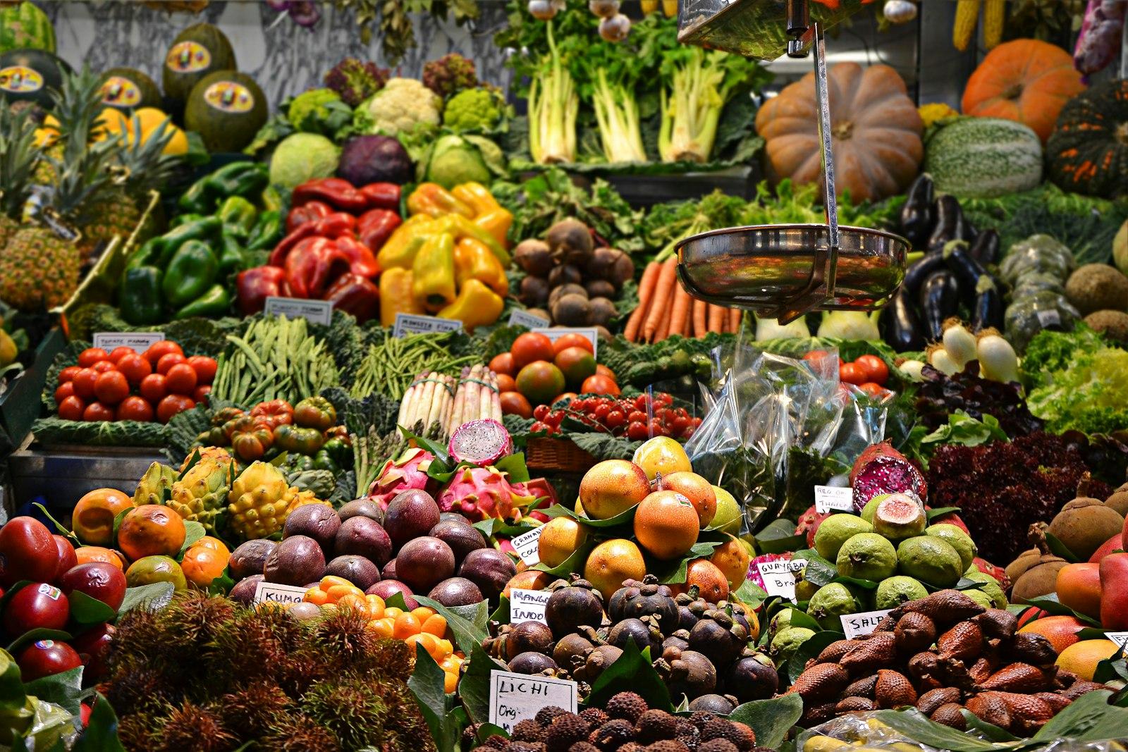 Outdoor farmers market with colorful produce and vendor stalls โ Dubuque Farmers Market